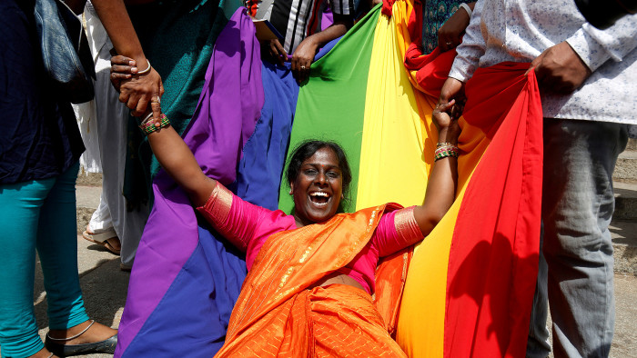 An activist of lesbian, gay, bisexual and transgender (LGBT) community celebrates after the Supreme Court's verdict of decriminalizing gay sex and revocation of the Section 377 law, in Bengaluru, India, September 6, 2018. REUTERS/Abhishek N. Chinnappa      TPX IMAGES OF THE DAY - RC19DE7B83C0