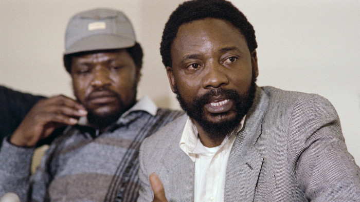 Secretary General of National Union of Mineworkers (NUM), Cyril Ramaphosa, gives a press conference, on August 30, 1987, in Johannesburg. (Photo credit should read WALTER DHLADHLA/AFP/Getty Images)