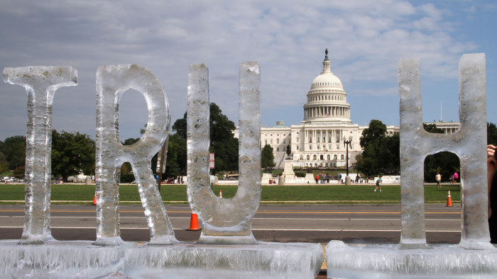 An ice sculpture is seen spelling out the word &quot;truth&quot; by artist duo Ligorano Reese, with the US Capitol in the background, in Washington, DC on September 22, 2018. - A poetic protest at the caustic state of politics in the era of &quot;fake news&quot; under President Donald Trump, &quot;Truth Be Told&quot; is the sixth sculpture in the Melted Away series launched in 2006 by Marshall Reese and Nora Ligorano, who are both 62 years old and have collaborated on art projects for nearly four decades. (Photo by Olivia HAMPTON / AFP) / RESTRICTED TO EDITORIAL USE - MANDATORY MENTION OF THE ARTIST UPON PUBLICATION - TO ILLUSTRATE THE EVENT AS SPECIFIED IN THE CAPTION (Photo credit should read OLIVIA HAMPTON/AFP/Getty Images)