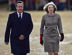 LONDON, ENGLAND - OCTOBER 21:  Prime Minister David Cameron and Home Secretary Theresa May arrive for a ceremonial welcome for the President of Singapore at Horse Guards Parade on October 21, 2014 in London, England. The President is at the beginning of his four day stay during which he will hold a bilateral meeting with Prime Minister David Cameron. (Photo by Toby Melville - WPA Pool/Getty Images)