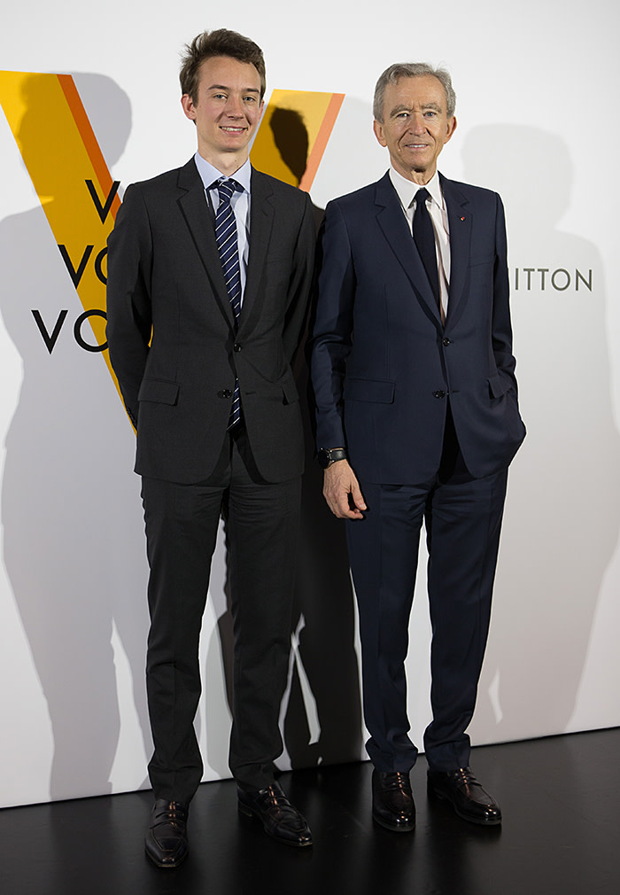 TOKYO, JAPAN - APRIL 21: Frederic Arnault (L) and LVMH Chairman and CEO Bernard Arnault (R)attend the Louis Vuitton Exhibition &quot;Volez, Voguez, Voyagez&quot; on April 21, 2016 in Tokyo, Japan. (Photo by Christopher Jue/Getty Images)