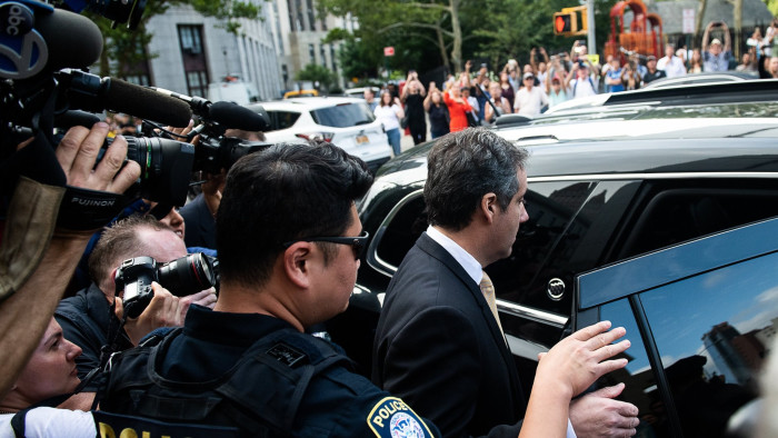 Michael Cohen, former personal lawyer to U.S. President Donald Trump, exits from federal court in New York, U.S., on Tuesday, Aug. 21, 2018. Trump's longtime lawyer and fixer Michael Cohen appeared in federal court Tuesday pleading guilty to federal charges stemming from hush payments to women who claimed to have had affairs with the president. Photographer: Mark Kauzlarich/Bloomberg