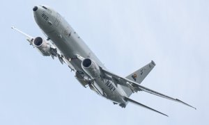 Boeing P-8 Poseidon maritime reconnaissance jet aircraft flying in the U.K. for the first time at 2014 Farnborough Airshow...E56AJX Boeing P-8 Poseidon maritime reconnaissance jet aircraft flying in the U.K. for the first time at 2014 Farnborough Airshow