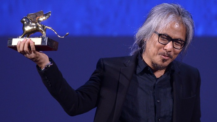 Director Lav Diaz with his Venice Film Festival Golden Lion, awarded for 'The Woman Who Left'