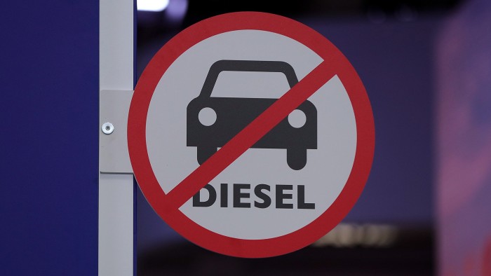 A 'no diesel' sign sits on the Iveco Ltd truck exhibition stand on display at the IAA Commercial Vehicles Show in Hanover, Germany, on Wednesday, Sept. 19, 2018. Volkswagen AGs truck unit is pushing to reduce its dependence on its main European market and lift profit margins in a challenge to commercial-vehicle industry leaders Daimler AG and Volvo AB. Photographer: Krisztian Bocsi/Bloomberg