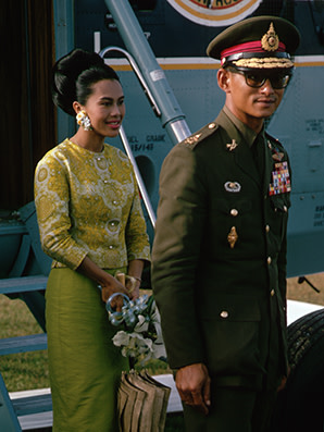 King Rama IX and Queen Sirikit have arrived to visit the victims of a recent flood in Hat Yai, Thailand. (Photo by Dean Conger/Corbis via Getty Images)