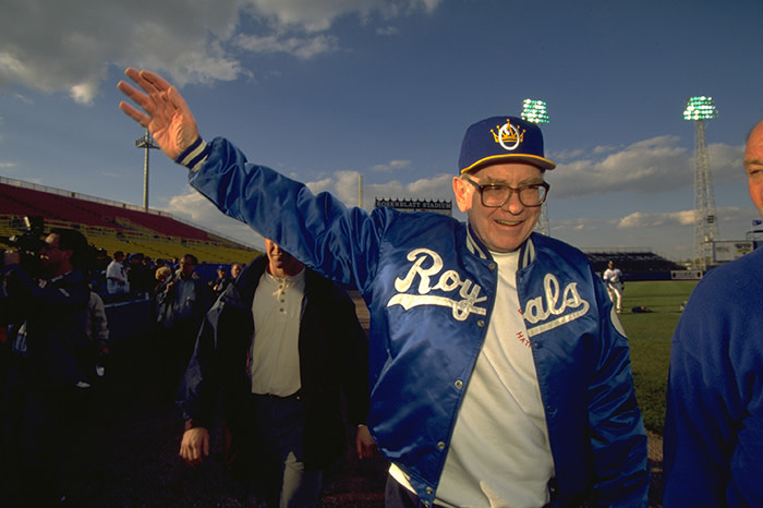 At an Omaha Royals baseball game in 1997; Buffett was a minority owner of the team between 1991 and 2012, and still enjoys attending games with his employees: “I’ve got 25 people out here. We go to baseball games together. They try to make my life good, I try and make their life good”