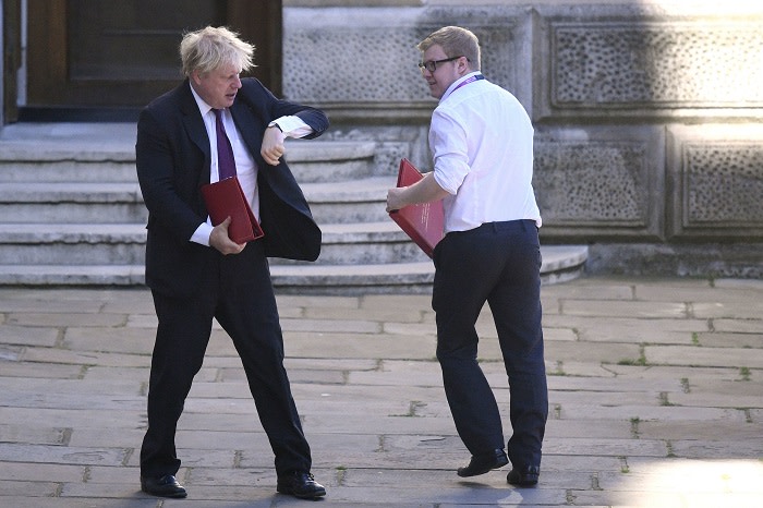 Foreign Secretary Boris Johnson leaves the Foreign Office on his way to Downing Street, London, for a cabinet meeting.