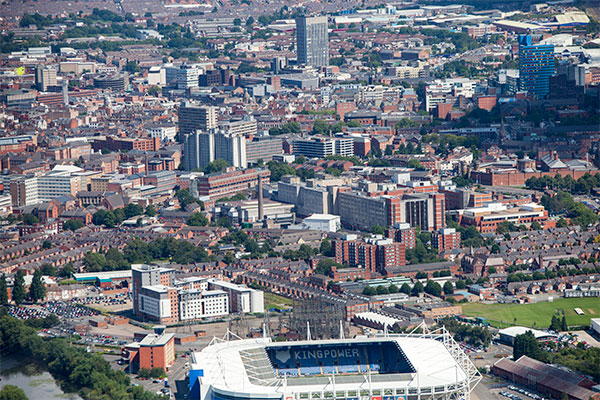 The city stretches out behind the King Power Stadium, photographed in 2012