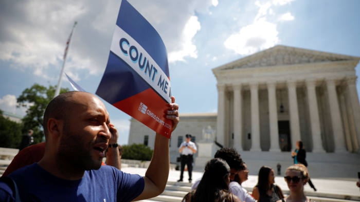 Counted: a protester outside the US Supreme Court, which ruled that the Trump administration did not give an adequate explanation for plans to add a citizenship question to the  census