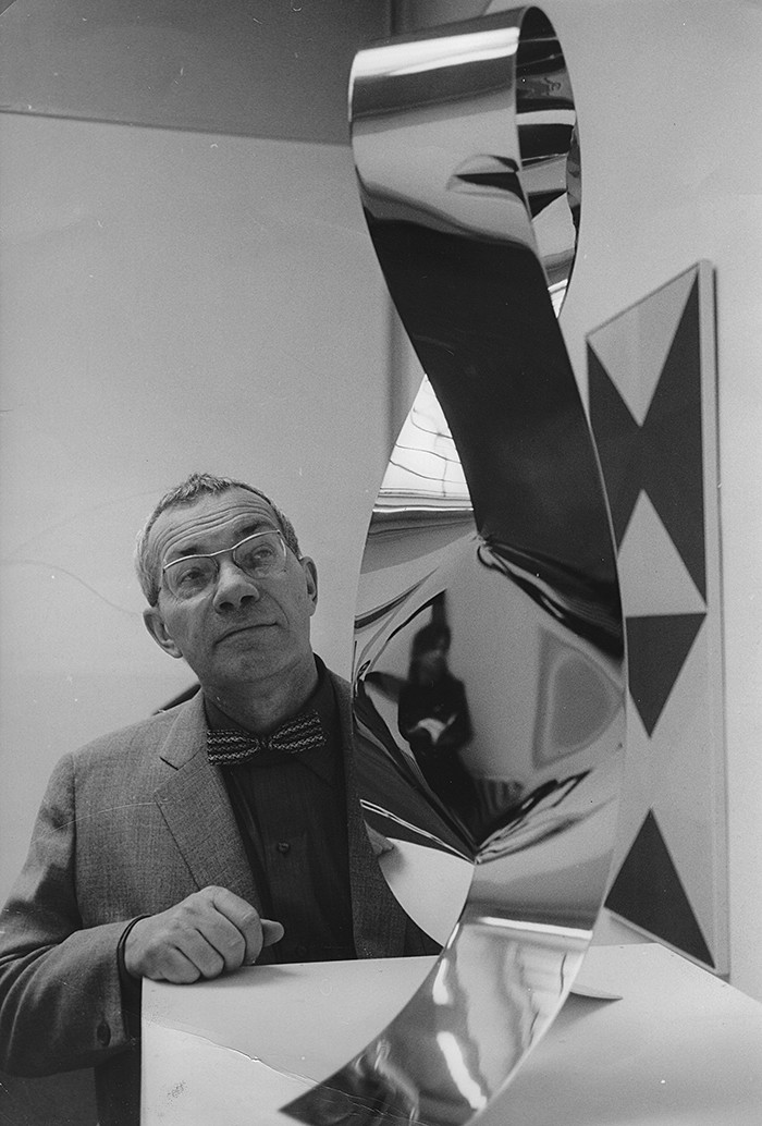 Artist and architect Max Bill with one of his sculptures at the Kunsthalle in Bern (on the occasion of his 60th birthday). 1968. Photograph (Photo by Votava/Imagno/Getty Images)
