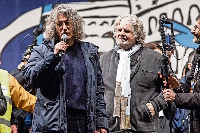 ROME, ITALY - FEBRUARY 22: Gianroberto Casaleggio (L) and Beppe Grillo, leader of the Movimento 5 Stelle, Five Star Movement, attend at Piazza San Giovanni the last political rally before the national election on February 22, 2013 in Rome, Italy. Italians go to the polls February 24 and 25 to replace Prime Minister Mario Monti's government. ? (Photo by Giorgio Cosulich/Getty Images)