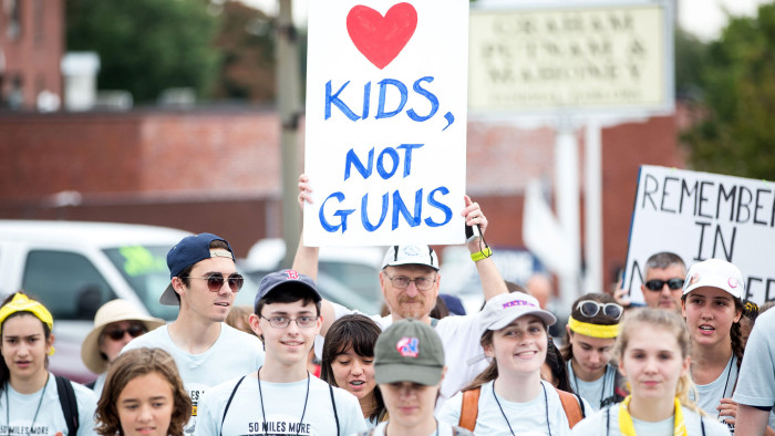 WORCESTER, MA - AUGUST 23: Parkland Shooting survivor and activist David Hogg, third from left, walks during the 50 Miles More walk against gun violence which will end with a protest at the Smith and Wesson Firearms factory on August 23, 2018 in Worcester, Massachusetts.  After the Parkland, Florida mass shooting, 50 Miles More was organized to engage young people in the effort to bring about gun reform legislation. (Photo by Scott Eisen/Getty Images)