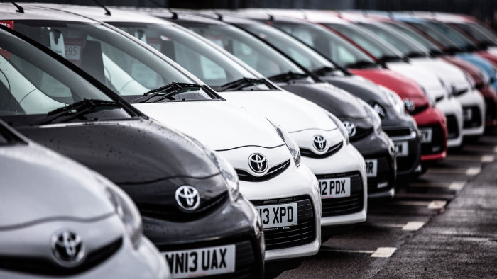 BRISTOL, ENGLAND - OCTOBER 06: A line of Toyota cars are offered for sale on the forecourt of a main motor car dealer in Brislington on October 6, 2015 in Bristol, England. Latest data from the Society of Motor Manufacturers and Traders (SMMT) show a record 462,517 new cars were registered in the UK last month, a 8.6% year on year increase, and that total sales in the year to date have hit 2,096,886, 7.1 percent higher than the same point last year and the first time the two million mark has been passed in September since 2004. The figures also showed a slight drop in the levels of drivers choosing diesel-engined cars, claimed in part to be due to the scandal that has surrounded Volkswagen and the disclosure that they cheated emissions tests on their diesel cars. (Photo by Matt Cardy/Getty Images)