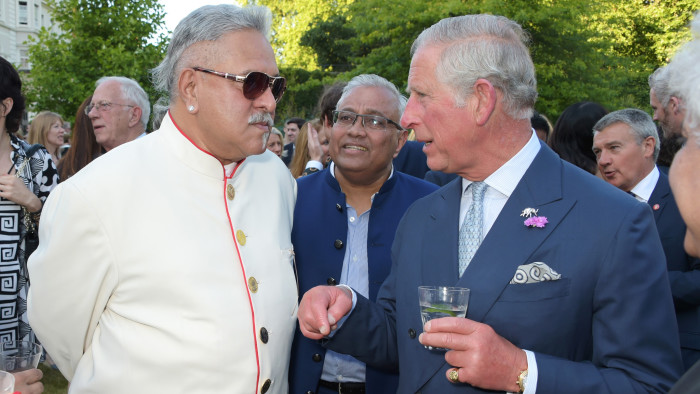 LONDON, ENGLAND - JUNE 30: Vijay Mallya (L) and Prince Charles, Prince of Wales, attend the Quintessentially Foundation and Elephant Family's Royal Rickshaw Auction presented by Selfridges at Lancaster House on June 30, 2015 in London, England. (Photo by David M. Benett/Dave Benett/Getty Images)