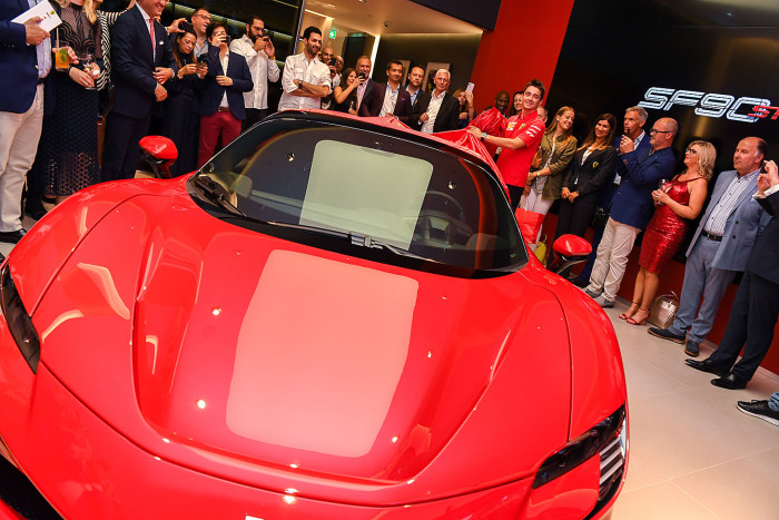 LONDON, ENGLAND - JULY 11: Charles Leclerc unveils the SF90 Stradale at the opening of H.R. Owen's new Ferrari showroom on Berkeley Square on July 11, 2019 in London, England. (Photo by Mike Marsland/Getty Images for Ferrari North Europe)