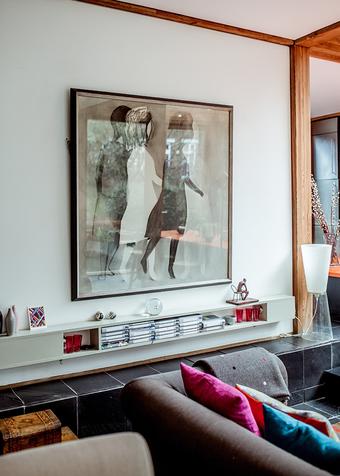 LUCY KELLAWAY shot at her modernist home in Hackney Artwork in the open living area. PHOTOGRAPHER: SOPHIA SPRING