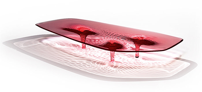 Zaha Hadid Liquid Glacial Colour Coffee Table Acrylic 15¾ by 106¼ by 35⅜ in 40 by 270 by 92.5 cm Executed in 2012, this work is a unique red version from an edition of 8, plus 2 printer's proofs and 2 artist's proofs Estimate $100/150,000 USD