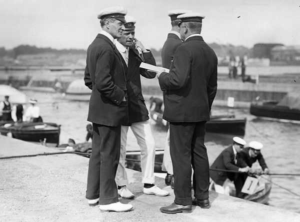 1907: Commander Mansfield Smith-Cumming (later head of the British Secret Service), Professor Redwood and Bernard Redwood at the Motor Yacht Club Reliability Trials on Southampton Water. (Photo by Topical Press Agency/Getty Images)