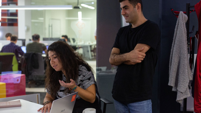 Gizem Akdas, 28 (left) and her business partner Umut Kaymaz, 29 (right) of Pet Surfer, in their working space on the campus of Istanbul Technical University (İstanbul Teknik Üniversitesi)