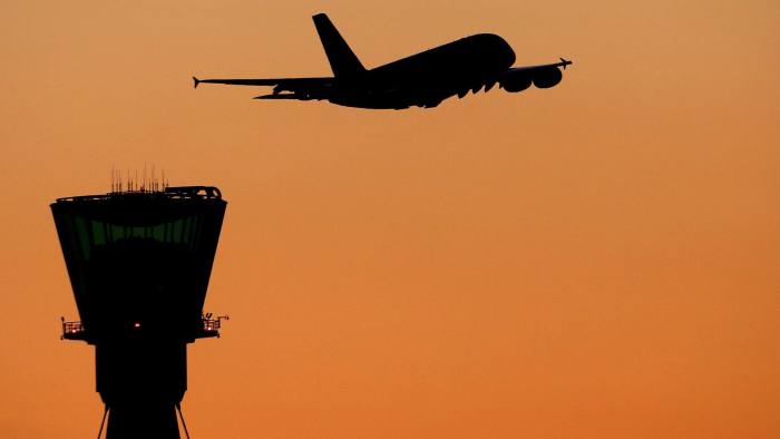 File photo dated 19/01/16 of a plane taking off past an air traffic control tower. An air disaster could be caused by low levels of English language ability among some pilots and air traffic controllers, a report has warned.