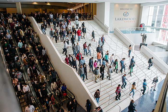 Congregants leaving Lakewood after a service – the church’s income in 2017 was $89m but just one per cent of that was spent on charitable causes