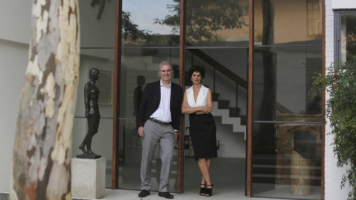 Fernanda Feitosa and her husband photographed at their home in Sao Paolo with artwork