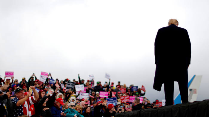 U.S. President Donald Trump attends a campaign rally for Republican U.S. Senate candidate Matt Rosendale at the Bozeman Yellowstone International Airport in Belgrade, Montana, U.S., November 3, 2018. REUTERS/Carlos Barria - RC111DA8EC40