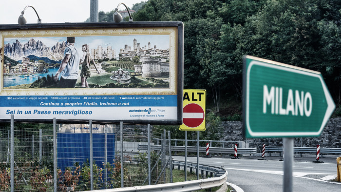 A billboard displays an advertisement for a rest area operated by Autostrade per l'Italia SpA, on the A7 Highway near Genoa, Italy, on Friday, Aug. 24, 2018. Italy's Deputy Prime Minister Matteo Salvini signaled support for a political compromise taking shape following last week's Genoa bridge collapse, saying he favored a government ownership role in toll-road operator Autostrade per l’Italia, but opposed nationalizing the highway network. Photographer: Federico Bernini/Bloomberg