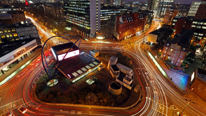 General Views Of London's Old Street Silicon Roundabout...Light trails from traffic are seen as they pass around the Old Street roundabout, in the area known as London's Tech City, in London, U.K., on Tuesday, Dec. 17, 2013. The U.K government last year pledged 50 million pounds for a new London startup incubator, and hired ex-Facebook Inc. executive Joanna Shields to promote Tech City, with Google Inc., Amazon.com Inc., and Cisco Systems Inc. all having taken space in the area or planning to do so. Photographer: Chris Ratcliffe/Bloomberg