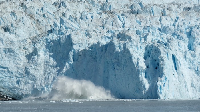 EQIP SERMIA, GREENLAND - JULY 31: Ice breaking off from the 200 meter tall face of the Eqip Sermia glacier, also called the Eqi glacier, crashes into the water below during unseasonably warm weather on July 31, 2019 at Eqip Sermia, Greenland. The Eqip Sermia glacier is located approximately 350km north of the Arctic Circle, and while the calving of ice from its face is a natural process going back millions of years, the glacier's retreat of about 3 km over the last 100 years is a new phenomenon. (Photo by Sean Gallup/Getty Images)