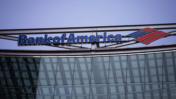 A logo sits on display outside the Bank of America Corp. offices in the Canary Wharf business and shopping district in London