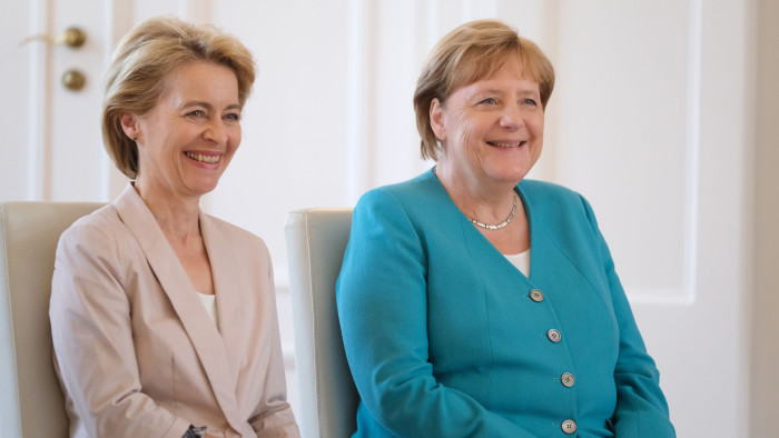 BERLIN, GERMANY - JULY 17: German Chancellor Angela Merkel (R) and outgoing Defense Minister Ursula von der Leyen attend the appointment ceremony of new Defense Minister Annegret Kramp-Karrenbauer at Schloss Bellevue on July 17, 2019 in Berlin, Germany. Von der Leyen is relinquishing her post following her election yesterday by the European Parliament by a slim margin as new president of the European Commission. (Photo by Sean Gallup/Getty Images)