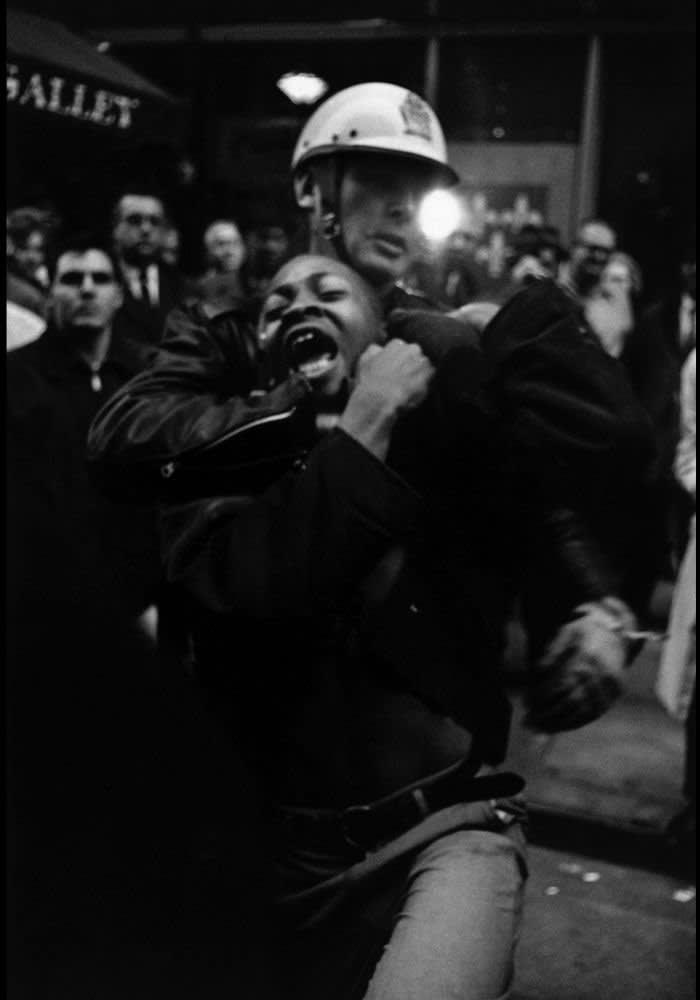 USA. Atlanta, Georgia. Taylor Washington yells as he gets arrested. Winter 1963-1964. Danny Lyon / magnum photos