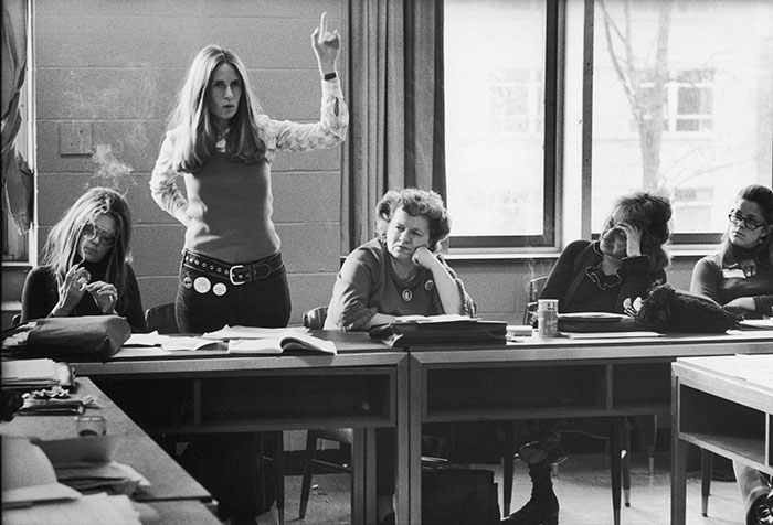 Brenda Feigen Fasteau (with hand raised) at a 1972 meeting of the National Women’s Political Caucus with Gloria Steinem (left), Wilma Scott Heide (centre) and Betty Freidan (second right)
