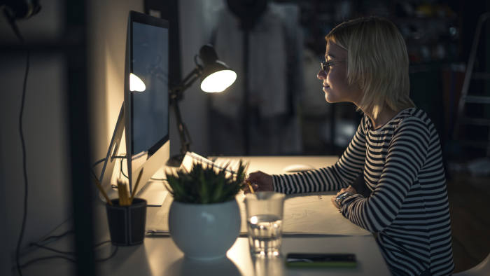 Young businesswoman working overtime at night in her office.  Universities’ current infatuation with Moocs reflects a misguided belief that the internet will make educational content creation a bigger and better business