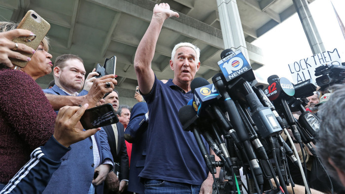 25 January 2019, US, Ft. Lauderdale: Roger Stone (C), a former campaign advisor to US President Donald Trump, speaks to the media after his release, outside the Federal Courthouse. Stone was arrested on Friday over charges of obstruction of justice. Photo: Amy Beth Bennett/Sun Sentinel via Zuma Wire/dpa