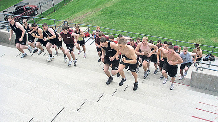 Initiation: new recruits to the Gentle Giant removals company in Massachusetts are put to the test in Harvard stadium
