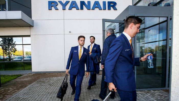 Staff leave Ryanair headquarters at Airside Business Park in Dublin on September 21, 2017. Ryanair chief executive Michael O'Leary on September 21, 2017, said he could not rule out axing more flights, but added any additional cancellations would not be linked to ongoing pilot roster problems. / AFP PHOTO / Paul FAITH (Photo credit should read PAUL FAITH/AFP/Getty Images)