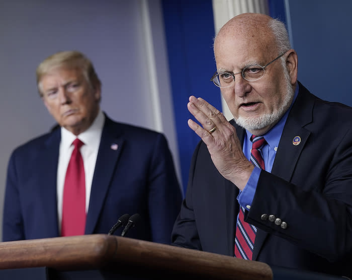 Trump and Robert Redfield at a daily briefing of the coronavirus task force at the White House. Trump chose Redfield to head the CDC despite  of widespread warnings about the former military officer’s controversial record on HIV-Aids