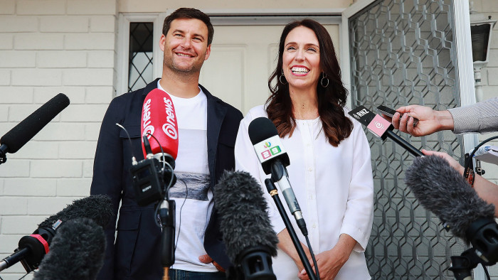 AUCKLAND, NEW ZEALAND - JANUARY 19: Prime Minister Jacinda Ardern and her partner Clarke Gayford speak to the media January 19, 2018 in Auckland, New Zealand. Jacinda Ardern and her partner Clarke Gayford are expecting their first child in June 2018. Deputy Prime Minister Winston Peters will take on Prime Ministerial duties for six weeks after the baby is born. (Photo by Hannah Peters/Getty Images)