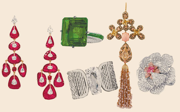 pieces from the G London collection (left to right) include earrings set with rubies and diamonds; emerald and diamond ring; diamond and titanium cuff; conch pearl and diamond tassel pendant and diamond and pink diamond ring