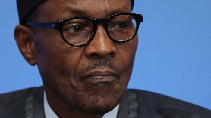 Nigerian President Muhammadu Buhari listens during a panel discussion during the Anti-Corruption Summit London 2016, at Lancaster House in central London on May 12, 2016.