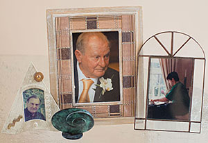 Photographs of Stephanie Shirley’s husband, Derek, and their son, Giles (right), who died in 1998