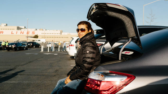 Brazilian Uber driver Oneyda Oliveira at the TNC airport waiting lot for Uber and Lyft drivers in San Francisco, Calif., Sunday October 1, 2017.