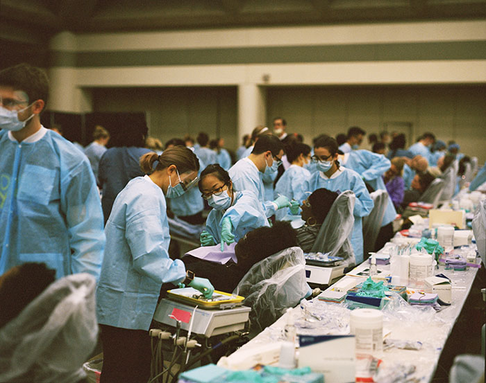 One alternative to crowdfunding: mobile clinics run by charities and non-profits such as Remote Area Medical. Here, dental students from the University of Maryland School of Dentistry, volunteer with RAM in Baltimore