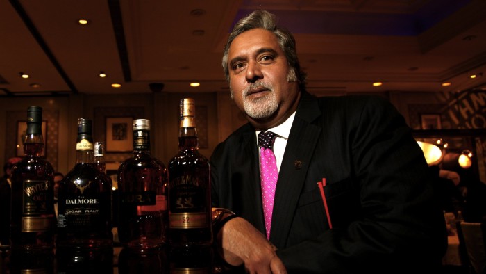 Vijay Mallya, chairman of UB Group, poses during a launch of his latest whiskey brand in New Delhi, India, on Saturday, Jan. 19, 2008. Mallya touches down at New Delhi's Indira Gandhi International Airport in his Airbus Corporate Jet on the afternoon of Jan. 19. Photographer: Namas Bhojani/Bloomberg News