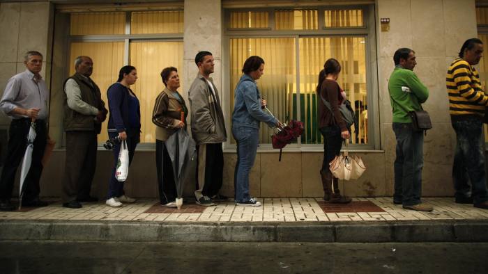 To match Insight EUROPE/LABOUR...People wait in line to enter a government job centre in Malaga, southern Spain in this April 29, 2011 file photo. Europe's relative lack of labour mobility can be pinned on cultural obstacles, as well as increasingly choosy employers and stiff competition from established migrants. For Spaniards, in particular, Europe is not working, and this highlights a structural trend just at the time the region needs to make the most of its single market for workers. To match Insight EUROPE/LABOUR REUTERS/Jon Nazca/Files (SPAIN - Tags: BUSINESS EMPLOYMENT POLITICS)