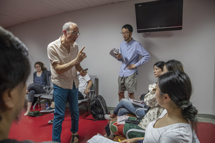 Beijing August 15th, 2018 British director Tim Supple in talk with actors ahead of a performance of a Chinese production of Shakespeare's The Tempest at the National Centre for Performing Arts. Gilles SabriÈ for The Financial Times