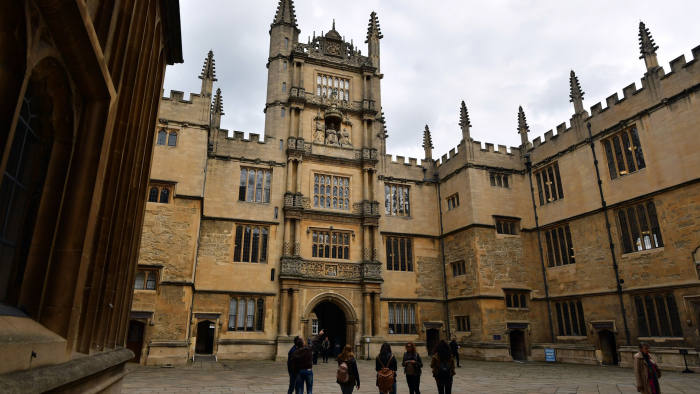OXFORD, ENGLAND - SEPTEMBER 20: Tourists visit the Bodleian Library on September 20, 2016 in Oxford, England. Oxford University has taken number one position in the 2016-2017 world university rankings beating off Harvard and Cambridge for the top spot. (Photo by Carl Court/Getty Images)
